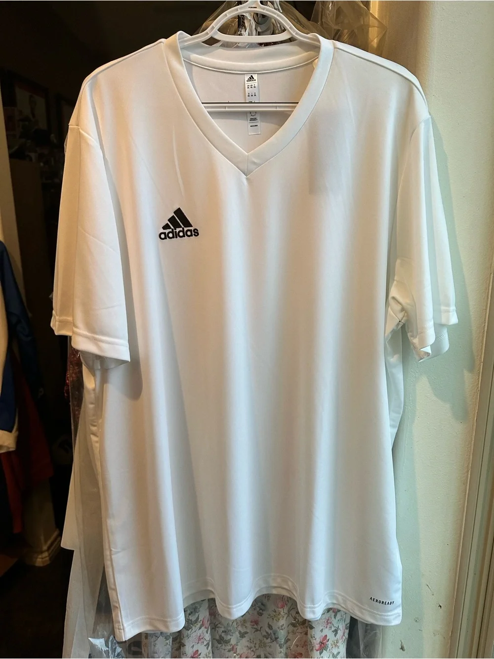 Adidas Entrada 22 Soccer Jersey with a V-neck and moisture-wicking technology